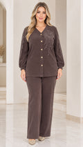 Front view of woman wearing brown ribbed button-down top with rhinestone embellishments and matching wide-leg pants