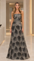 Front view of black strapless glitter scallop pattern evening maxi dress