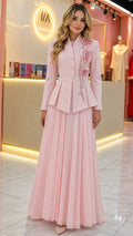 Front full view of women's blush pink peplum blazer and pleated maxi skirt set with 3D floral detail