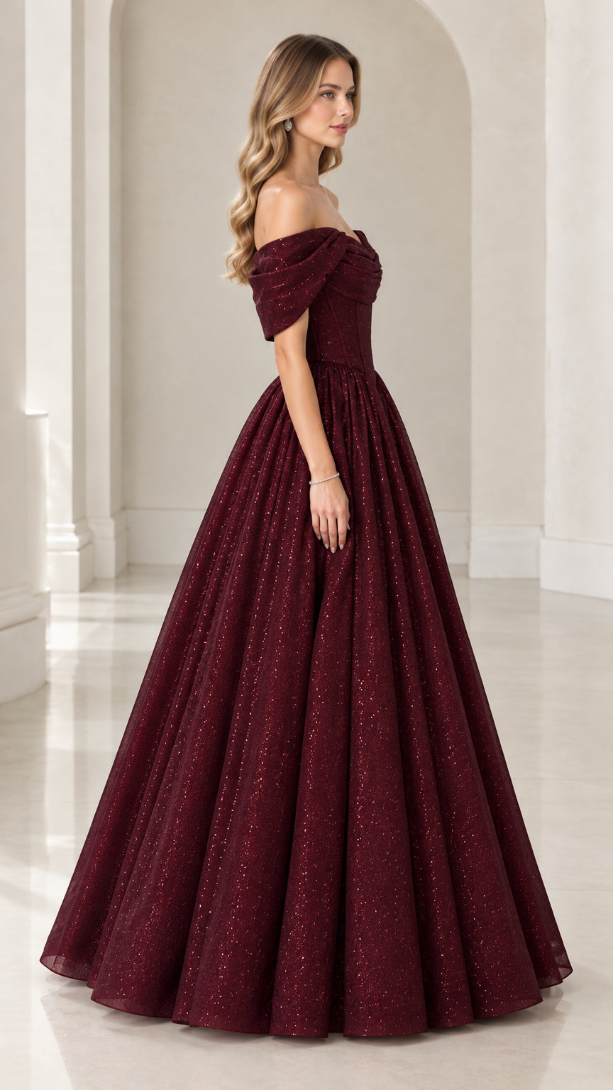 Side profile view of burgundy basque waist formal evening gown