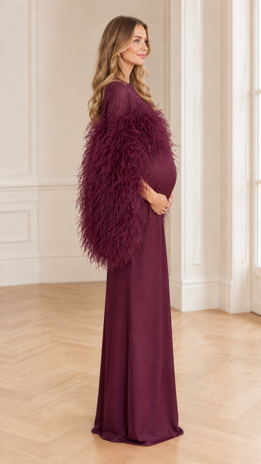 Burgundy feather trim maternity evening dress side bump profile