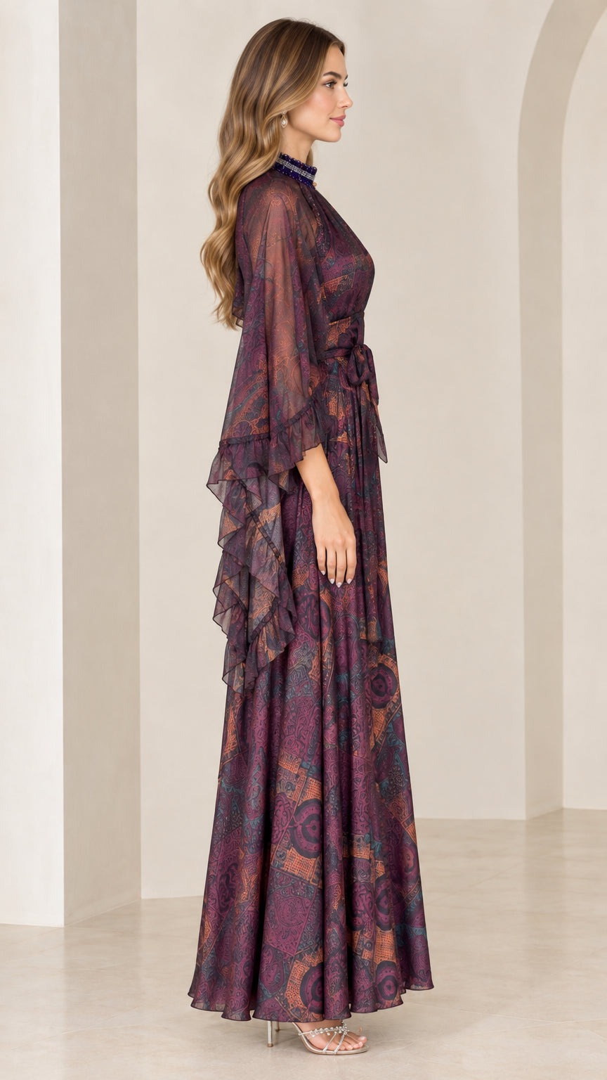 Side profile view of Plum Purple printed evening maxi dress showing cape sleeve drape