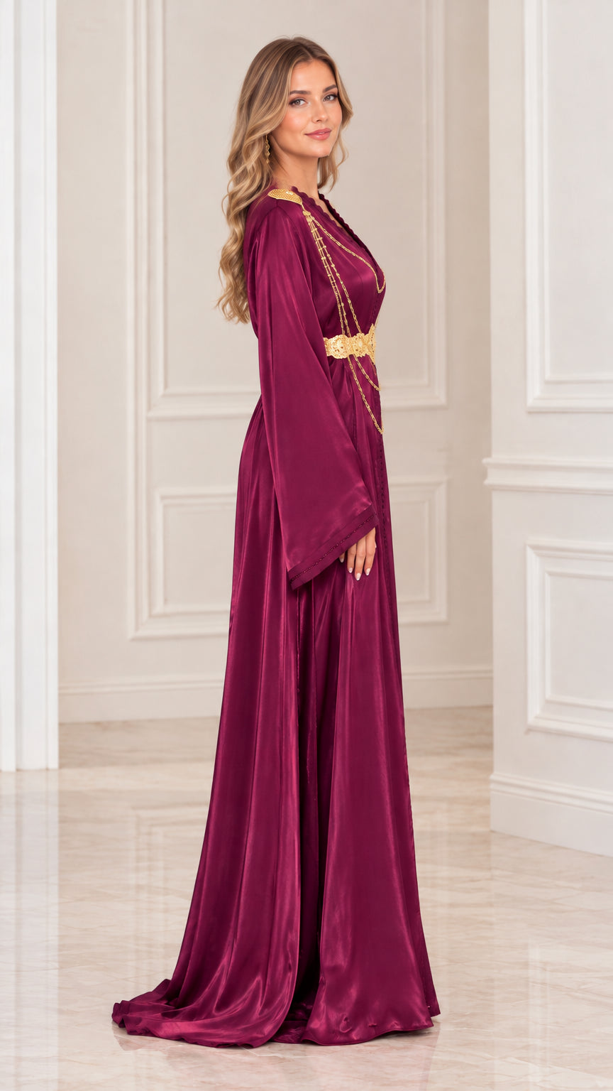 Side profile of woman in burgundy satin floor-length evening caftan gown