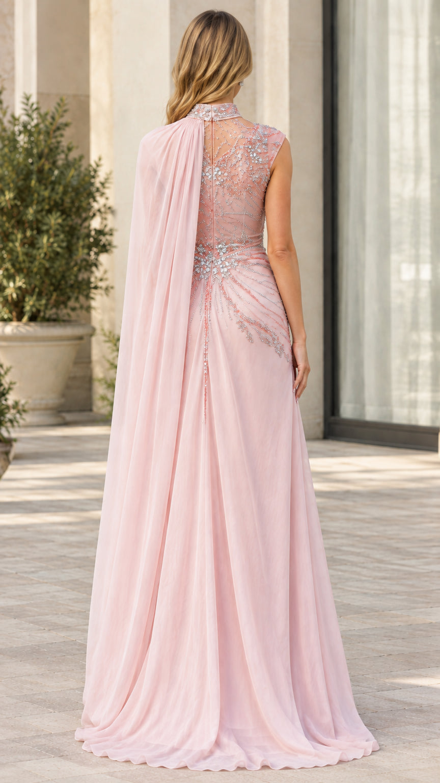 Back view of Blush Pink gown showcasing flowing chiffon cape train