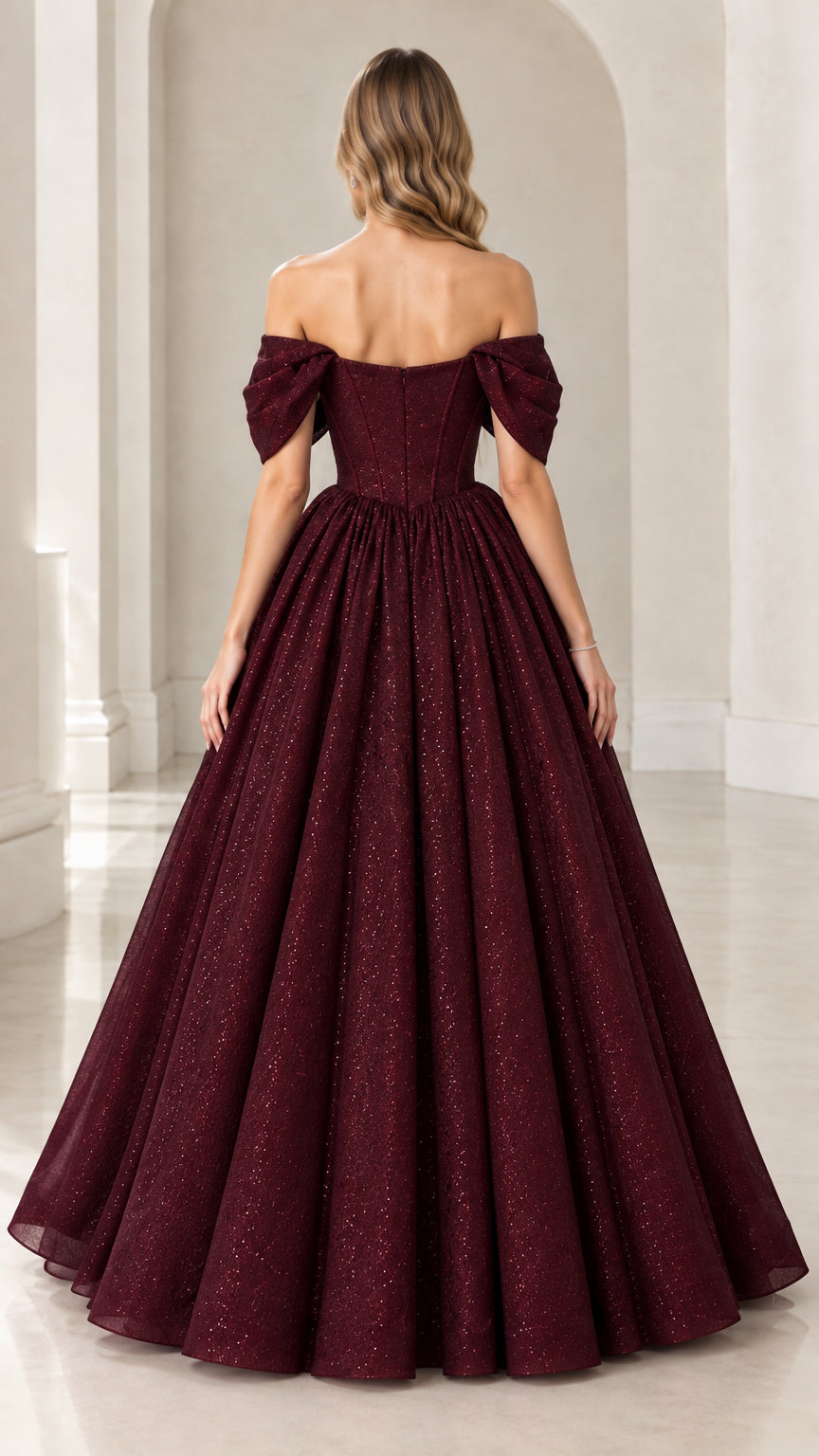 Back view of model in burgundy glitter off-the-shoulder ball gown