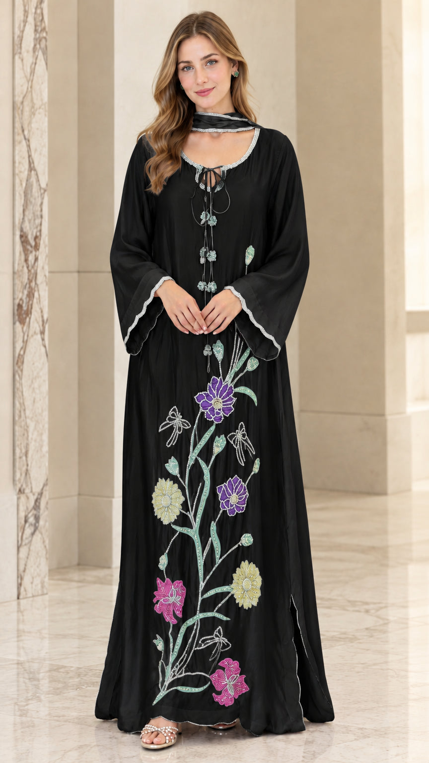 Front view of woman wearing Black floral embroidered beaded kaftan maxi dress