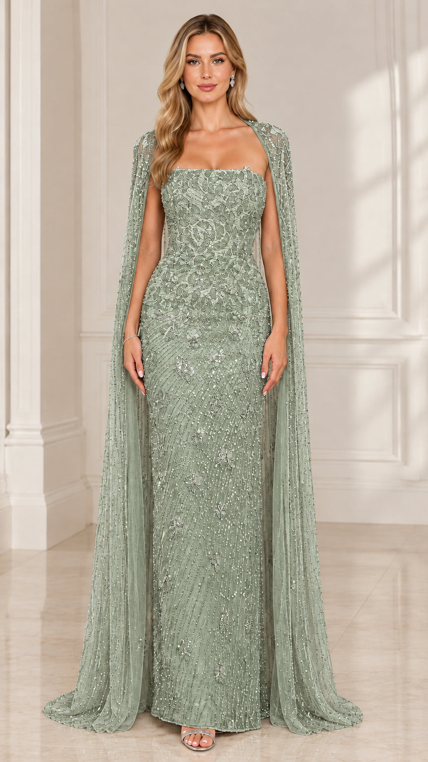 Front view of woman wearing sage green strapless beaded formal gown with cape overlay