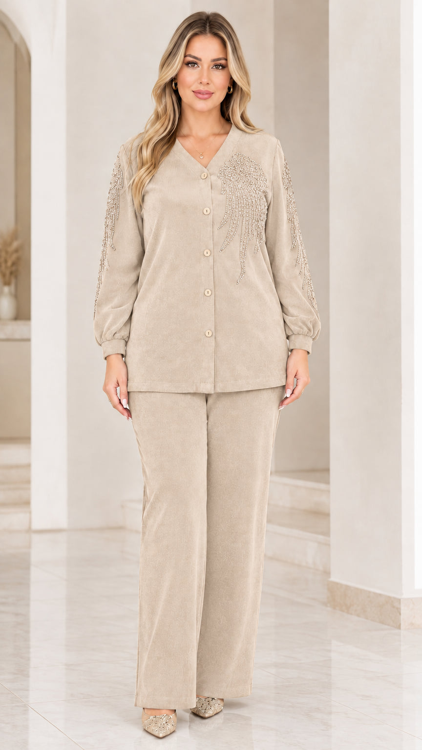 Front view of woman wearing beige oatmeal ribbed two-piece pant set